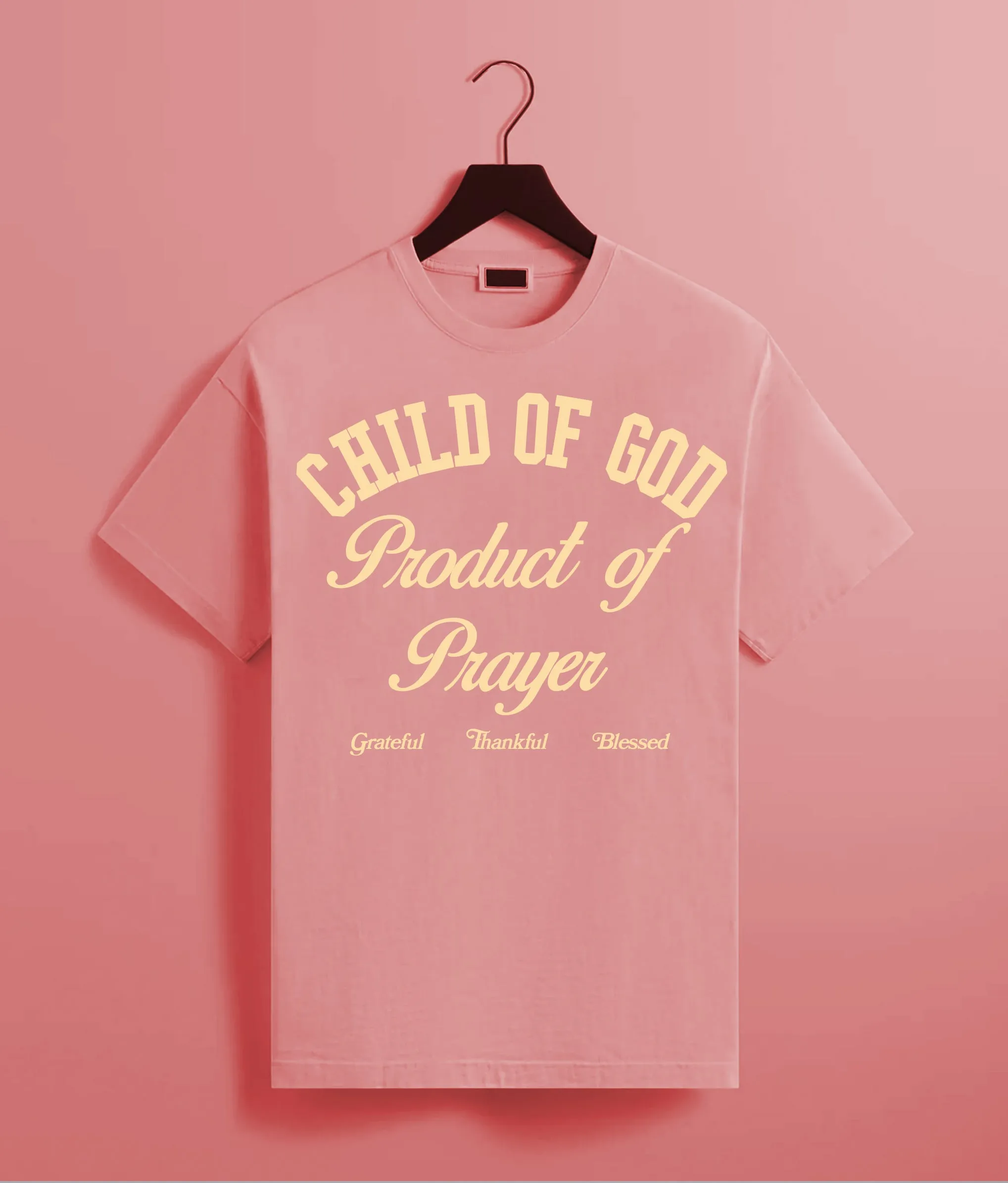 CHILD OF GOD PRODUCT OF PRAYER TEE (CORAL SILK/NATURAL)