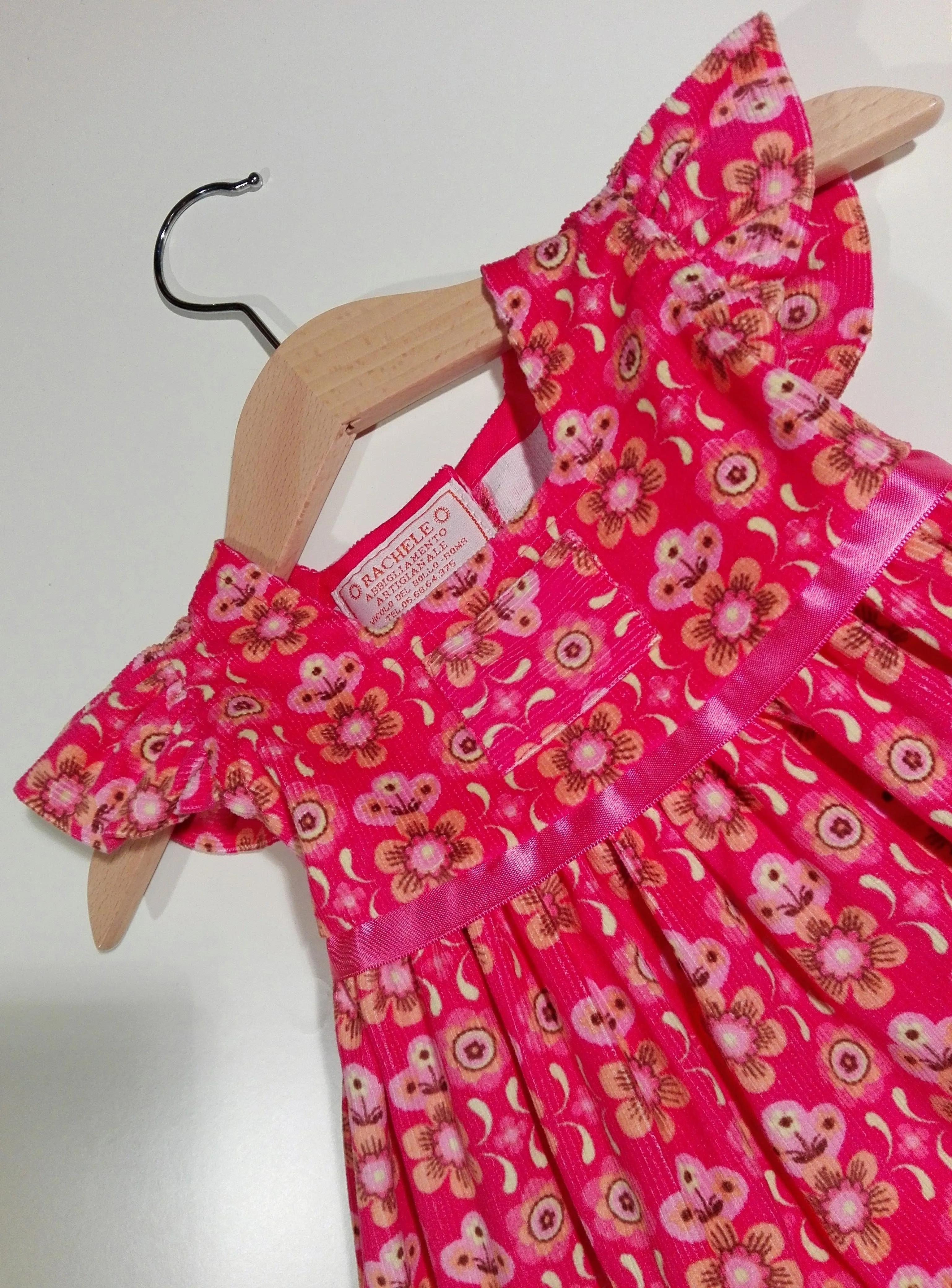 Dress with curled sleeve in corduroy