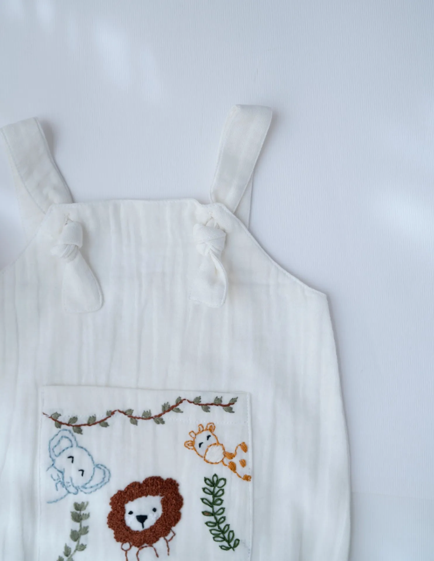 Jungle Pals Playsuit | Cotton Muslin Baby Romper | White